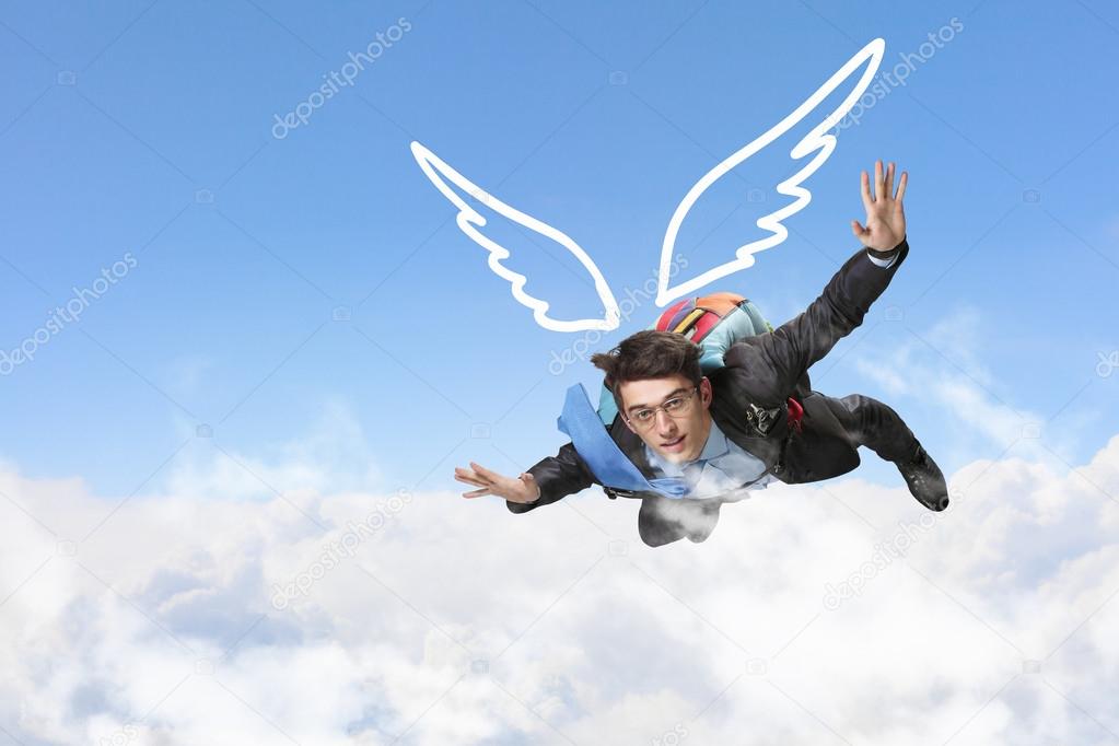 Businessman flying high