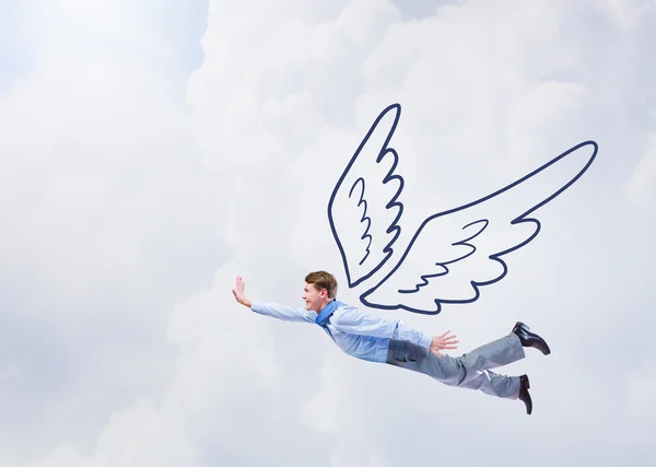 Businessman flying high — Stock Photo, Image