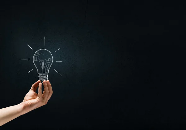 Great bright idea in darkness — Stock Photo, Image