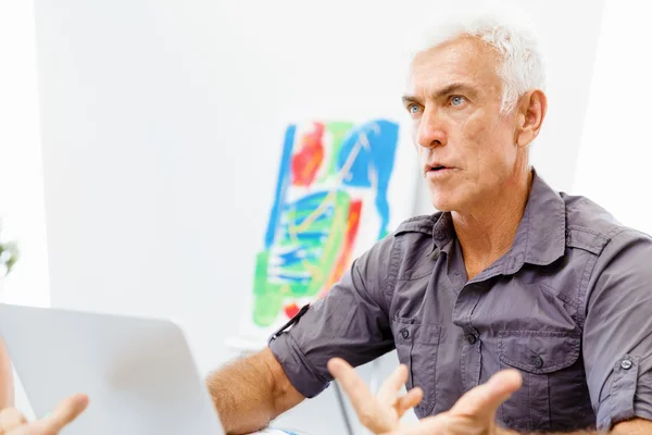 Handsome businessman in office — Stock Photo, Image