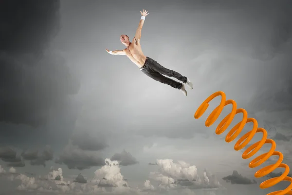 Man jump on springboard — Stock Photo, Image