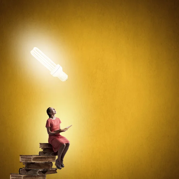 Woman in dress with book — Stock Photo, Image