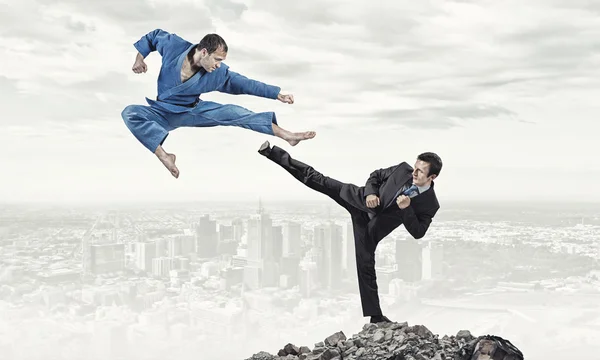 Karate man in blue kimino — Stock Photo, Image