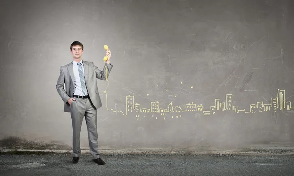 Man with phone receiver — Stock Photo, Image