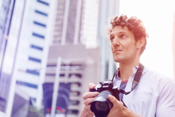 Male photographer taking picture — Stock Photo, Image