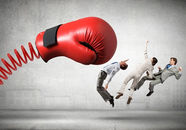 Businesspeople fighting with boxing glove — Stock Photo, Image