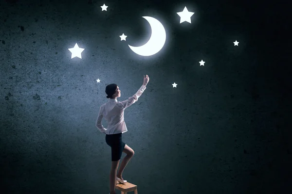 Woman touch the moon — Stock Photo, Image