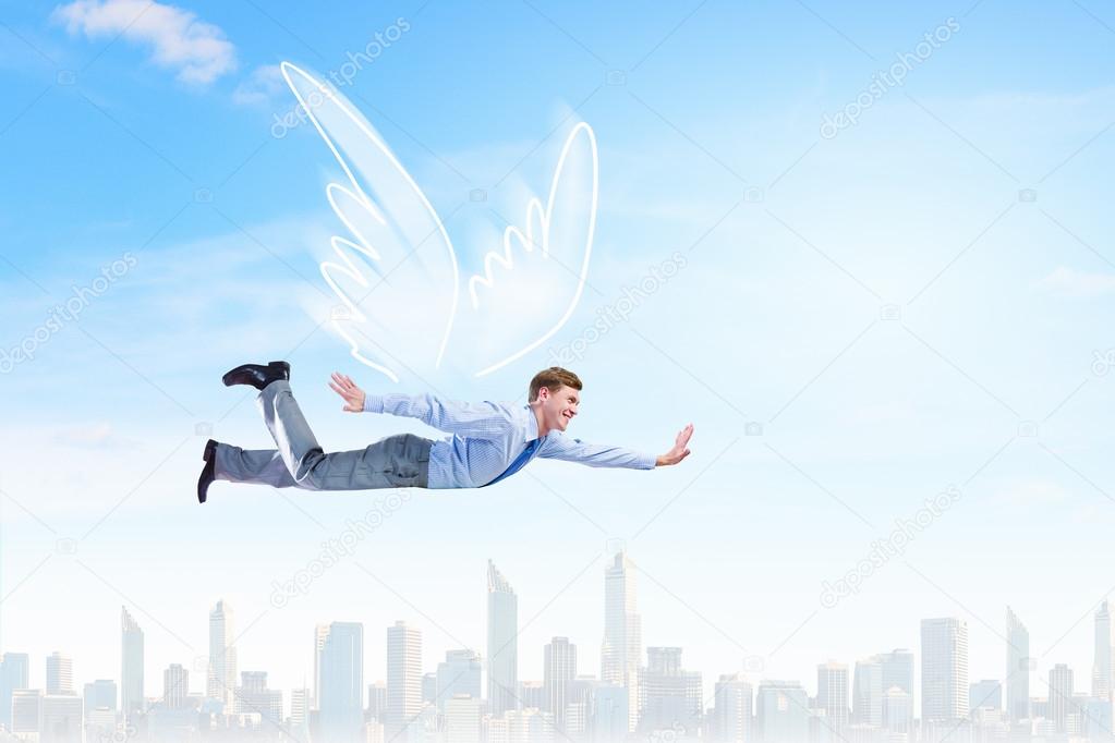 Businessman with angel wings