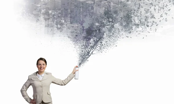 Woman spraying characters — Stock Photo, Image