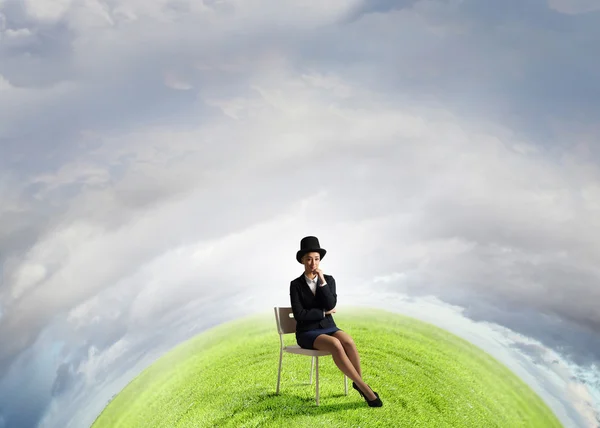 Girl in black cylinder — Stock Photo, Image