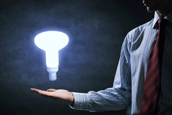 Bright idea in hand — Stock Photo, Image