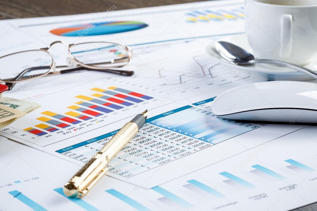 Financial charts and graphs on the table