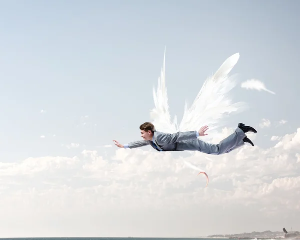 Empresário voando alto — Fotografia de Stock
