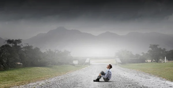 Businessman on road — Stock Photo, Image