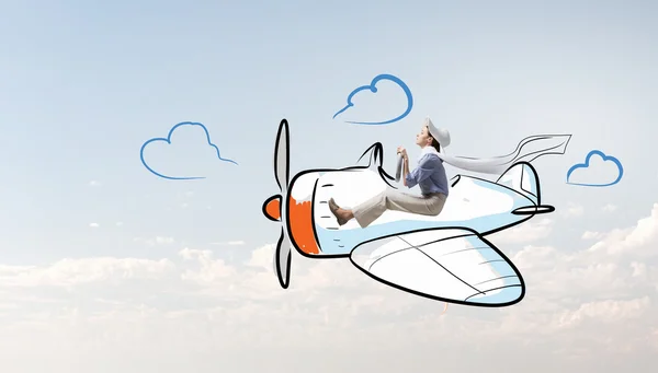 Woman in drawn airplane — Stock Photo, Image