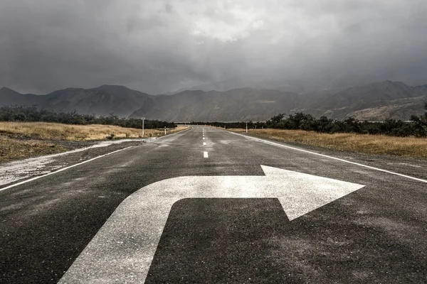 Turning sign on road — Stock Photo, Image