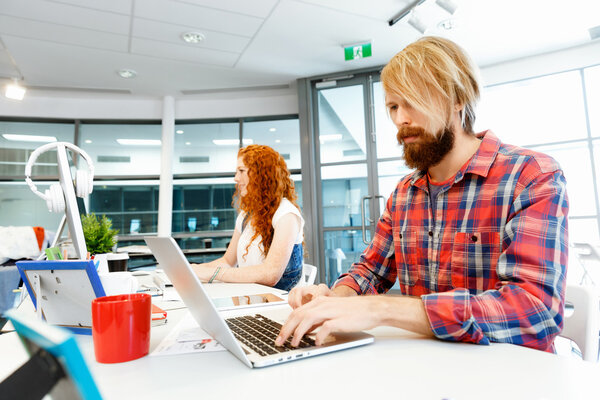 Two co-workers working together