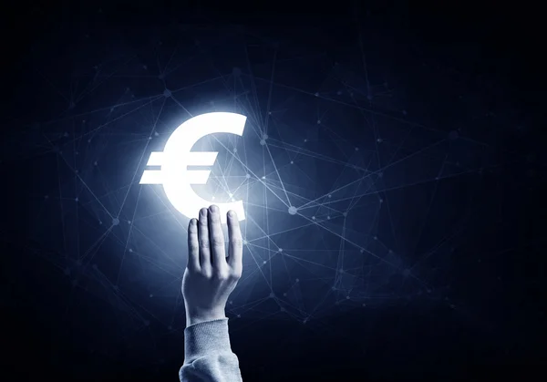 Símbolo euro na palma — Fotografia de Stock