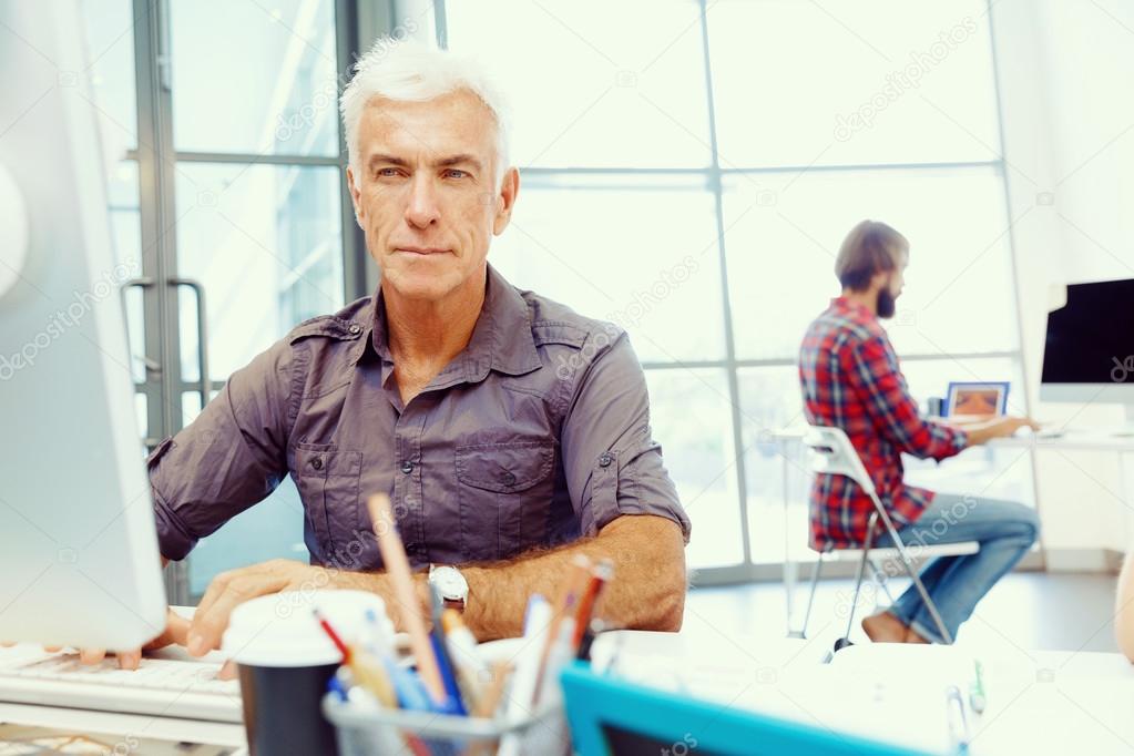 Handsome businessman in office