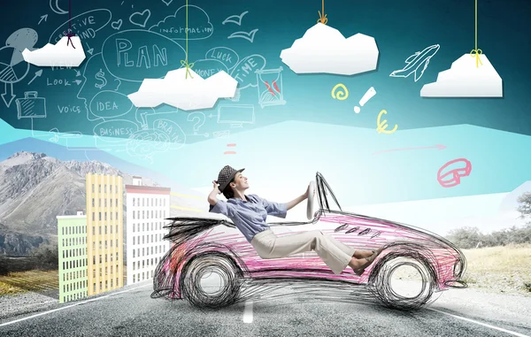 Woman in drawn car — Stock Photo, Image