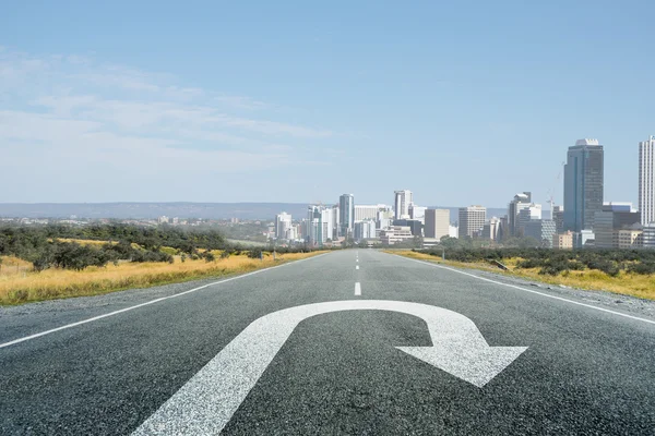 Turning sign on road — Stock Photo, Image