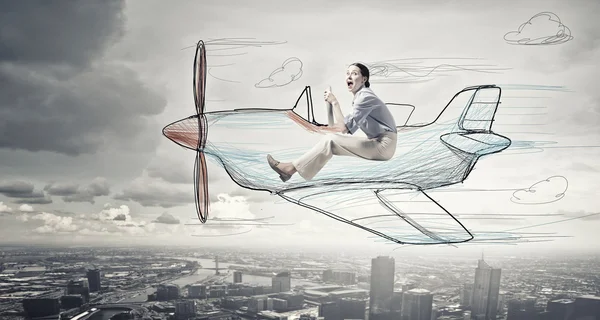 Vrouw in getekende vliegtuig — Stockfoto