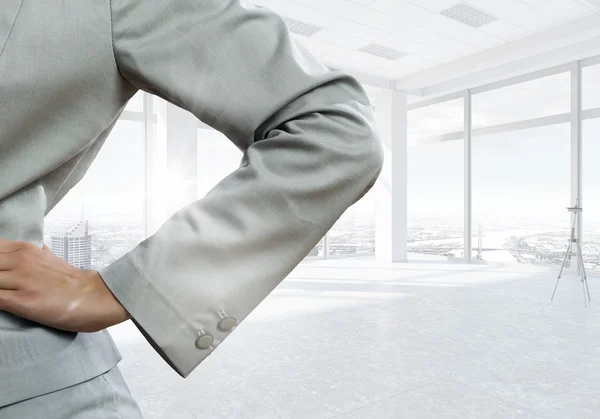 Businesswoman in top floor office — Stock Photo, Image