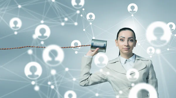 Woman with deaf phone — Stock Photo, Image