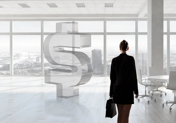 Businesswoman in top floor office — Stock Photo, Image