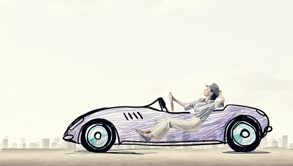 Woman in drawn car — Stock Photo, Image