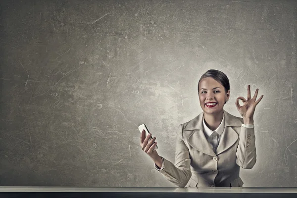 Attractive businesswoman in grunge style — Stock Photo, Image