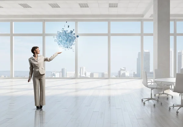 Businesswoman in top floor office — Stock Photo, Image