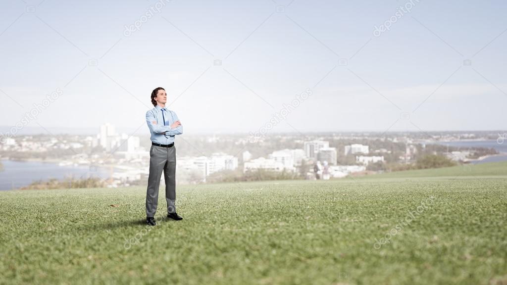 Confident businessman outdoors