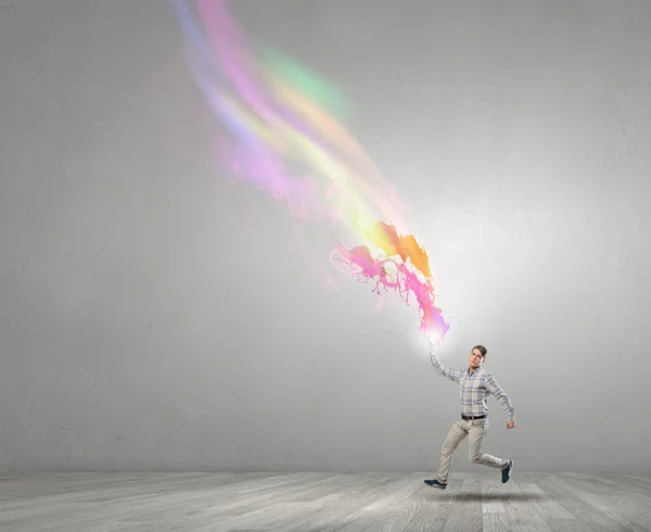 Man running with book — Stock Photo, Image