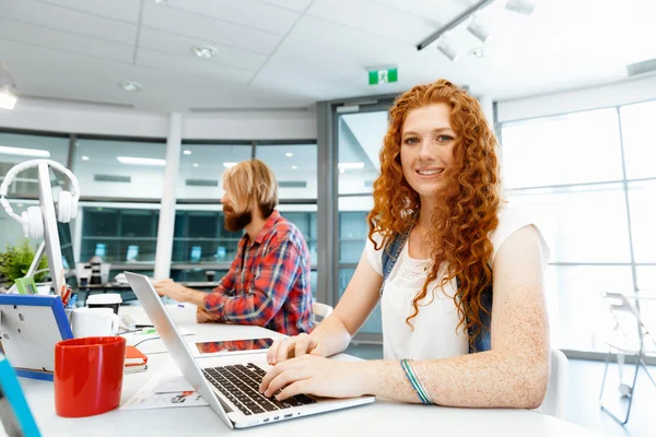 Creative business woman in office — Stock Photo, Image