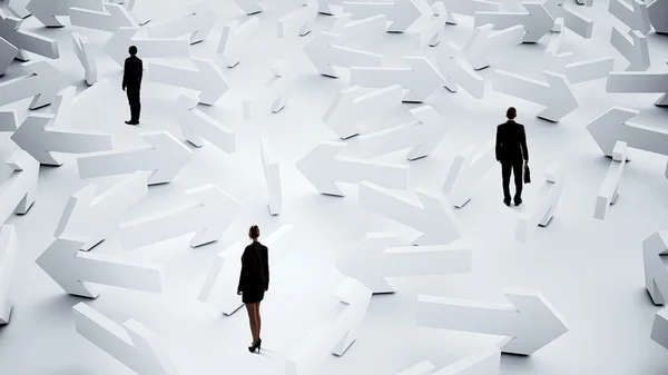 Businesspeople lost in maze — Stock Photo, Image