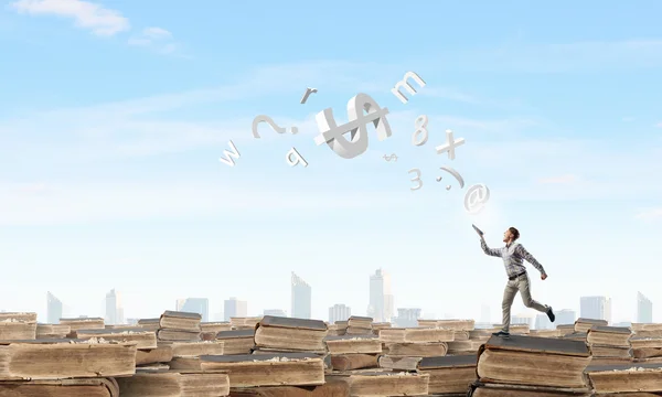 Books let you rise above the rest — Stock Photo, Image