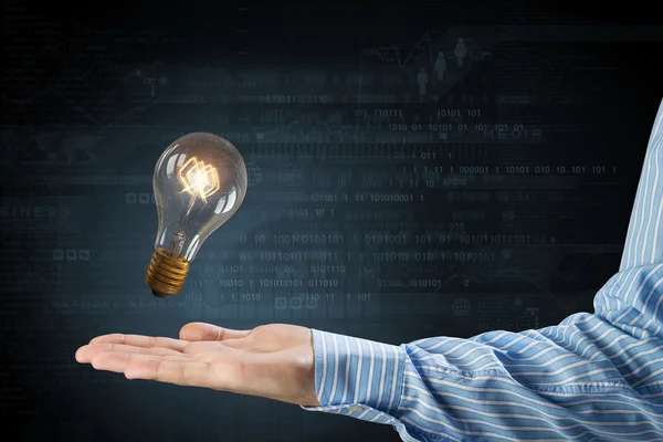 Bright idea in hand — Stock Photo, Image