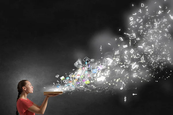 Girl holding opened book — Stock Photo, Image