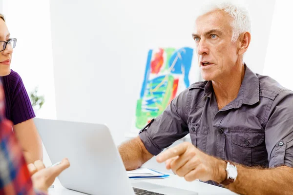 Handsome businessman in office — Stock Photo, Image