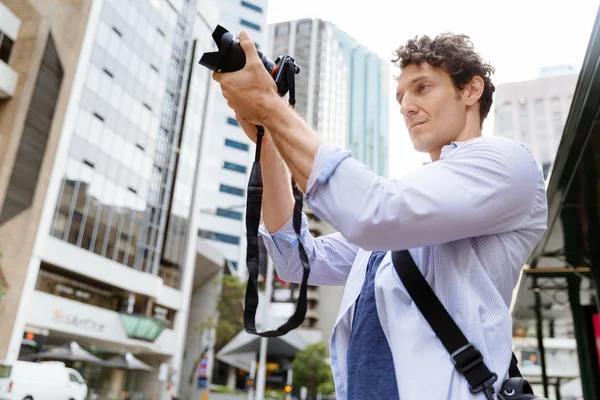 Male photographer taking picture — Stock Photo, Image