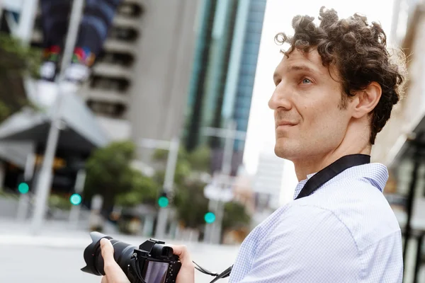 Male photographer taking picture — Stock Photo, Image