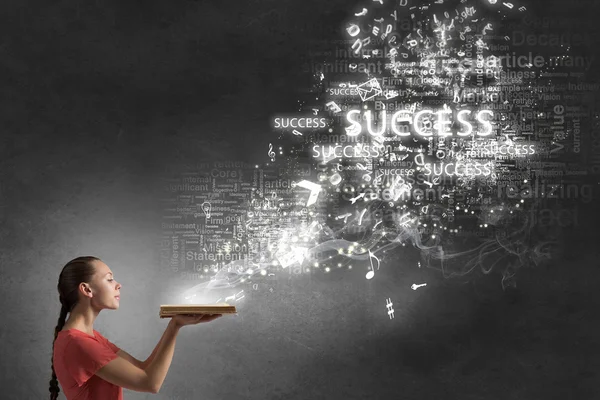 Girl holding opened book — Stock Photo, Image