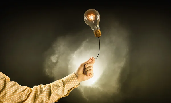 Idea brillante en la mano — Foto de Stock