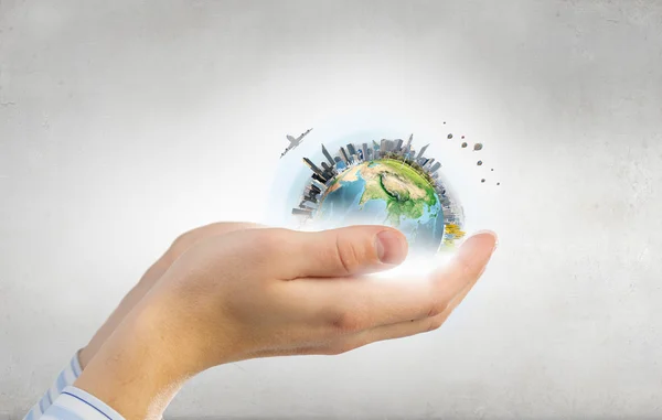 Framtiden för vår planet i dina händer — Stockfoto