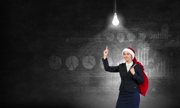 Santa woman with sack — Stock Photo, Image