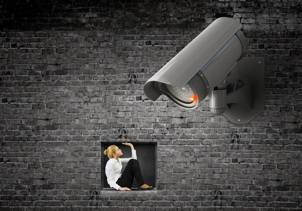 Camera keep an eye on woman — Stock Photo, Image