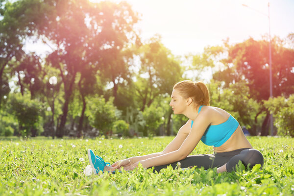 Girl practicing stretching exercises