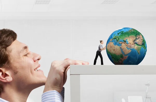 Boss peeping from under table — Stock Photo, Image