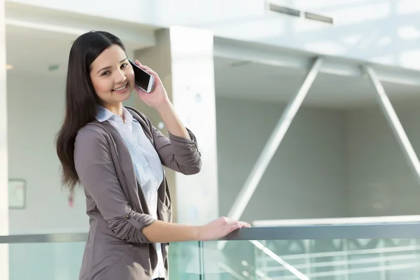 Attractive woman in office building — Stock Photo, Image